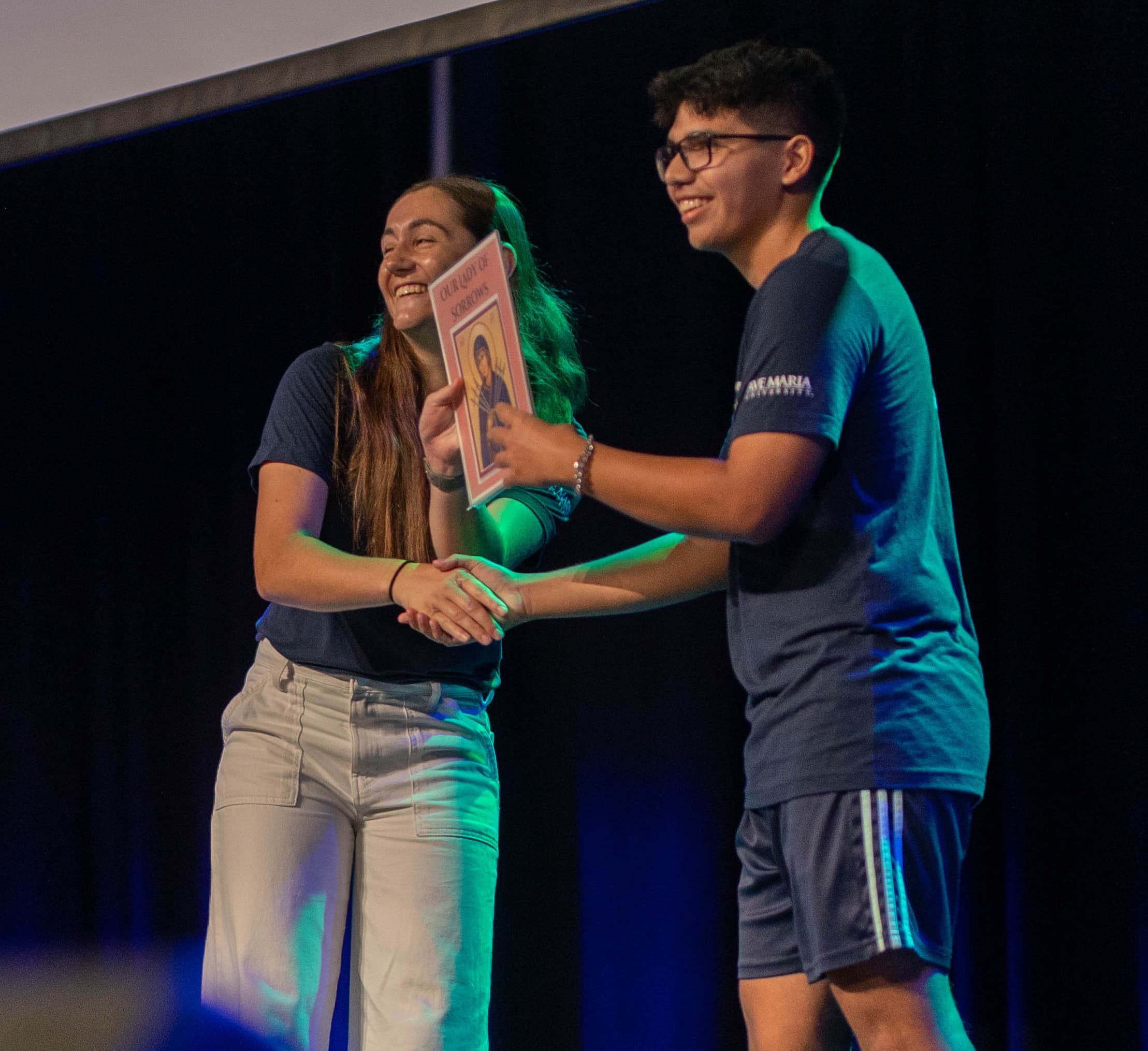 Student shaking hands