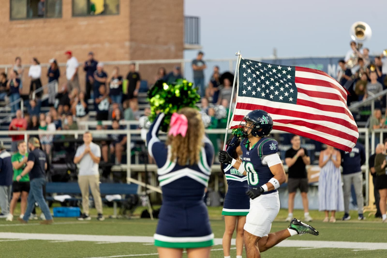 Game-day spirit among alumni and families at Gyrene Field