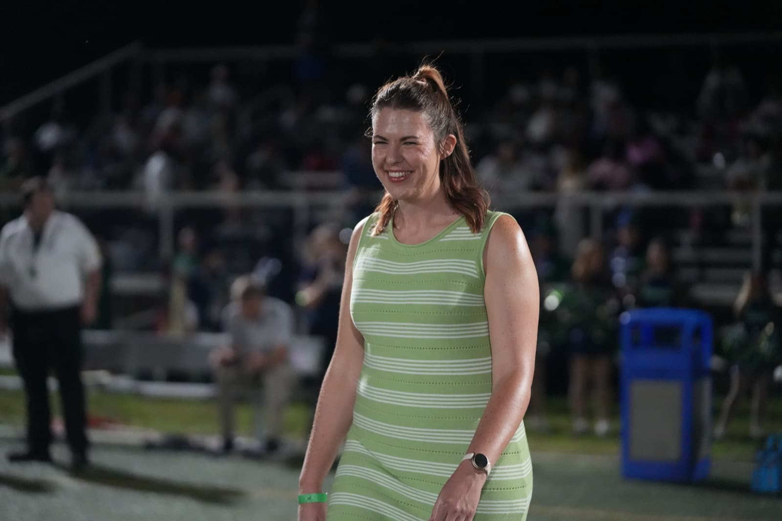 Alumni Award recipient recognized on stage during Homecoming Weekend