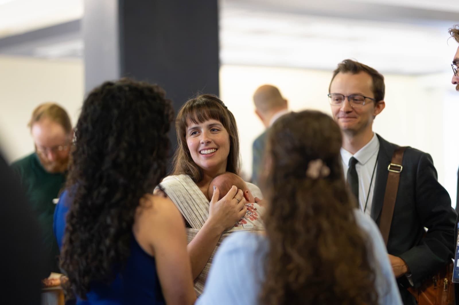 Alumni greeting university friends at the Homecoming reception