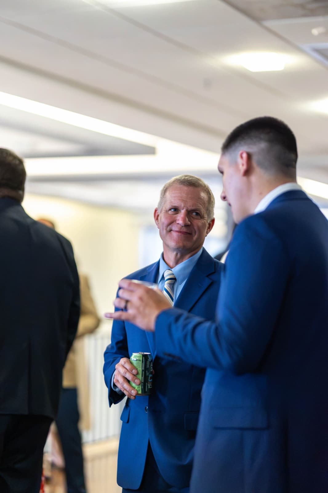 Alumni and faculty reconnecting during the Homecoming reception