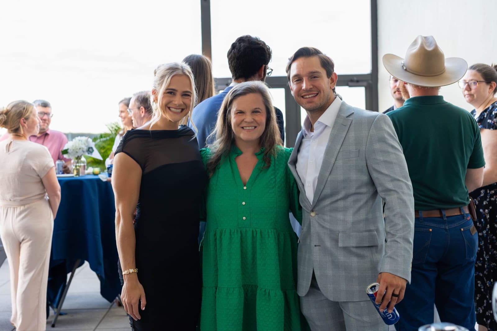 Alumni enjoying refreshments and camaraderie at the reception