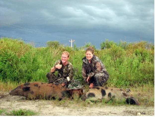 Anthony Jay with his wife, Allison, at Ave Maria, hunting wild hogs with bow and arrow at the request of Tom Monaghan.