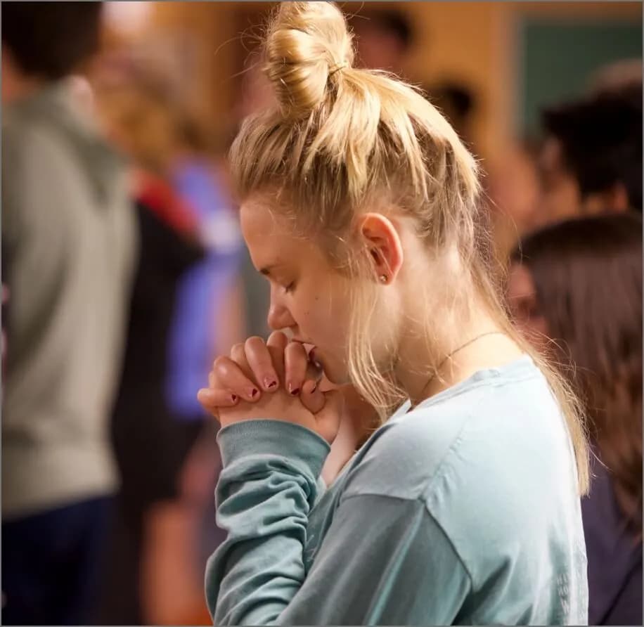 Students gathered in small-group discussion at an AMU retreat
