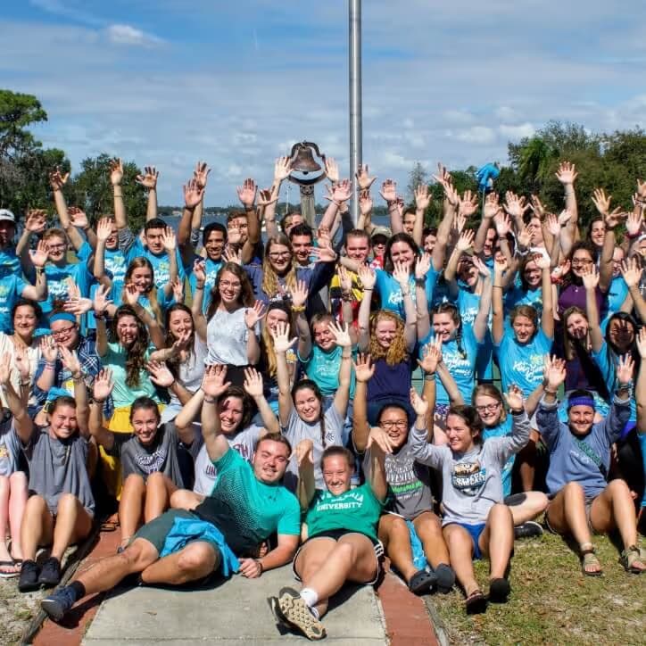 Students praying together during an AMU retreat